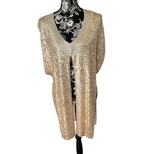Chicos size medium tan sleeveless top
Embellished with gold sequins Side slits
